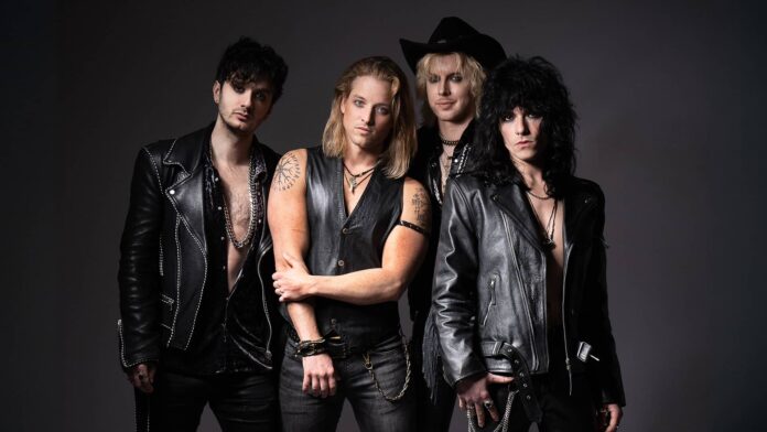 Band DeVere posing in leather attire for their new track release